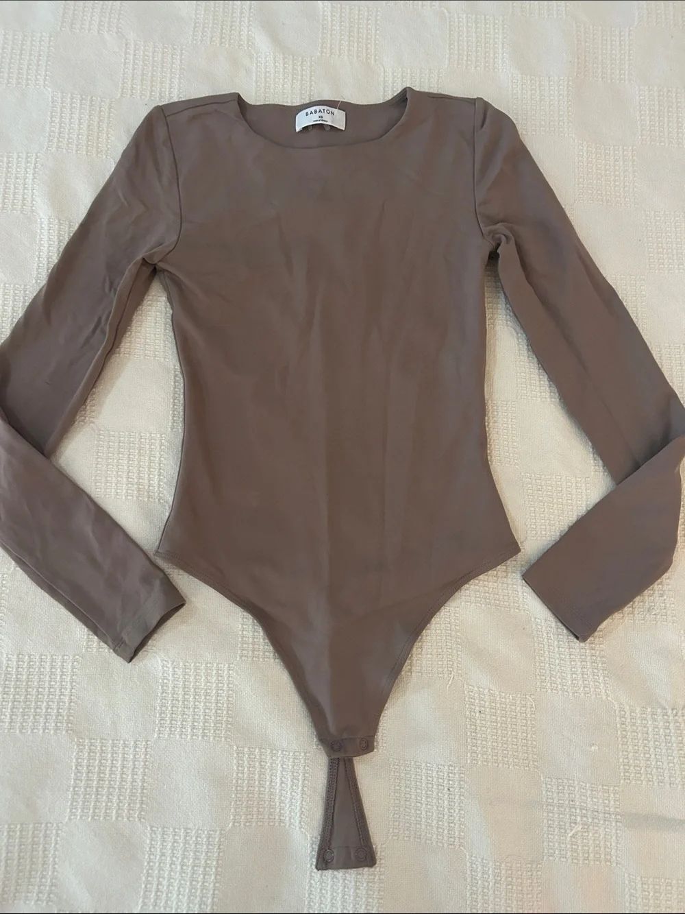 Babaton Long-Sleeve One-Piece Bodysuit in Taupe XS